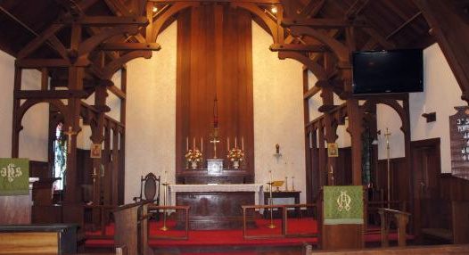 Angels with Censers are to the left and right of the altar at St. Michael and All-Angels Episcopal Church, Fort Bragg, California. Photo: Karin Faulkner