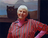 Dorr Bothwell in front of one of her paintings (c. 1980). Photo by Hugo Steccati.