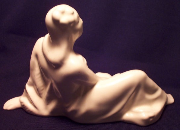 Above, two views of Dorr Bothwell's Reclining Samoan Woman (GMB C-808), with Ivory glaze, from Gladding, McBean's Catalina Art Ware.