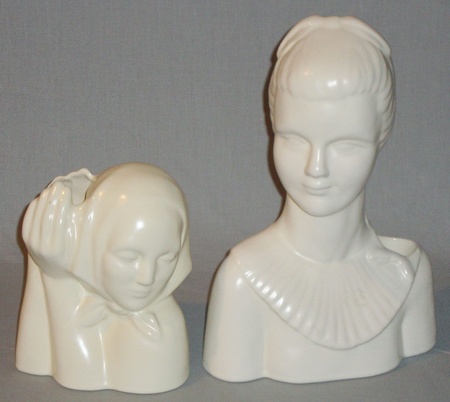 Peasant Head by Dorr Bothwell to the left of Woman with Collar, probably designed by Jean Lawyer, both shapes were produced in Gladding, McBean's Catalina Art Ware line, (Cream glaze).