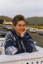 Hilda Pertha on her deck overlooking the Mendocino Headlands, upstairs in the Zacha's Bay Window Gallery building.